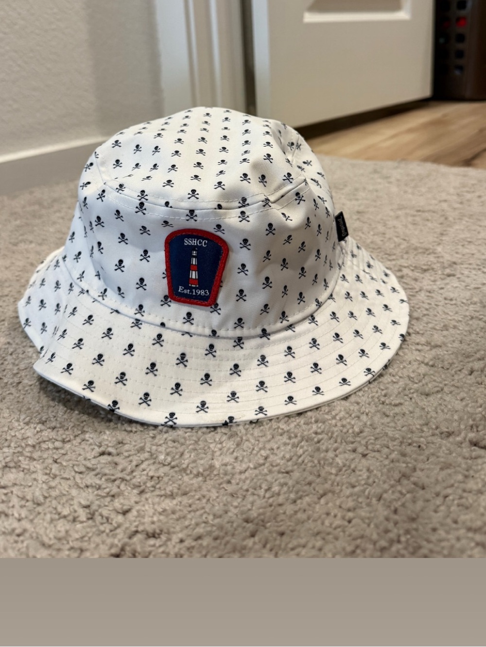 White Bucket Hat with Navy Skull Print